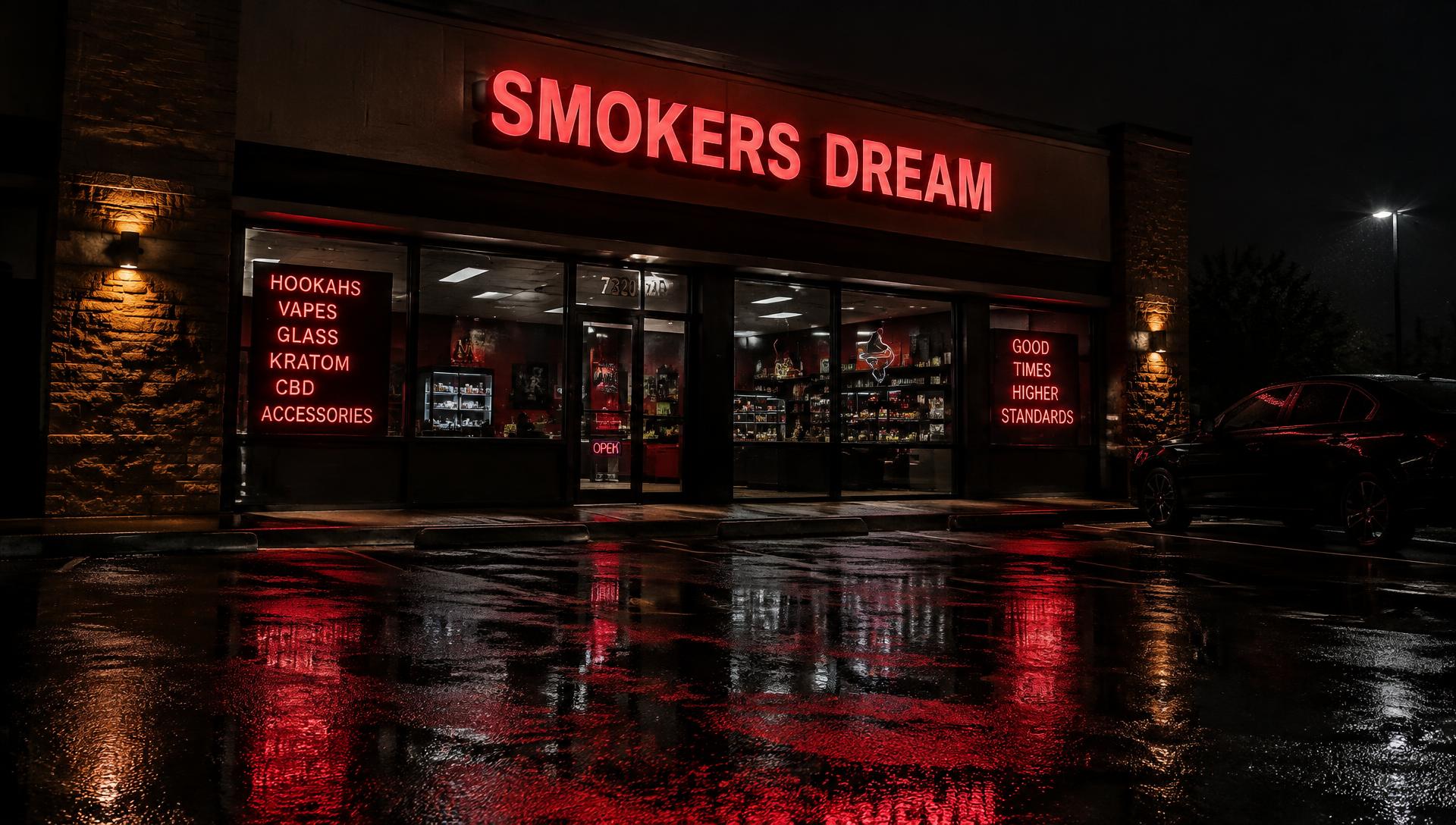 Smokers Dream storefront lit by red neon at night